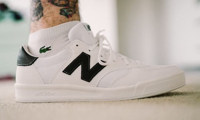 man wearing New Balance sneakers