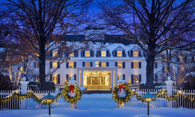 A photograph of the Woodstock Inn & Resort in the snow.